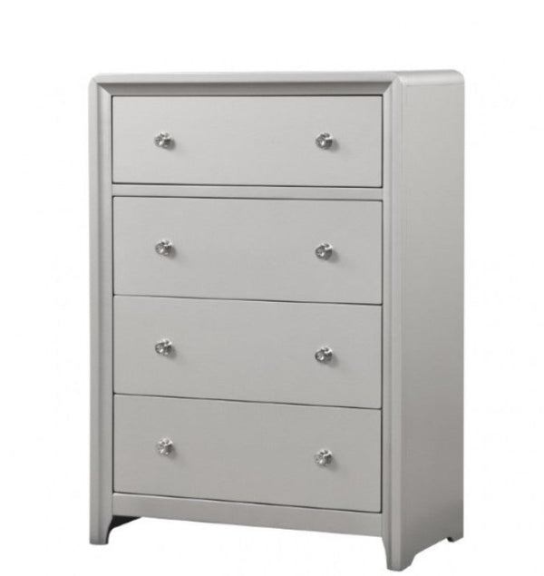 Borch Contemporary Champagne Finish Chest A five-drawer chest of drawers in a light gray finish, featuring small round silver knobs and a slightly tapered, modern silhouette, shown on a plain white background.
