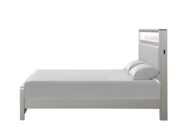 A modern single bed frame in a light gray finish, shown with a white mattress and two white pillows against a solid white background.