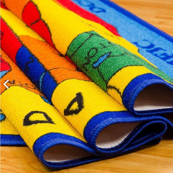 Brightstar US-Map Kids 5x8 Area Rug Colorful alphabet mats on a wooden surface