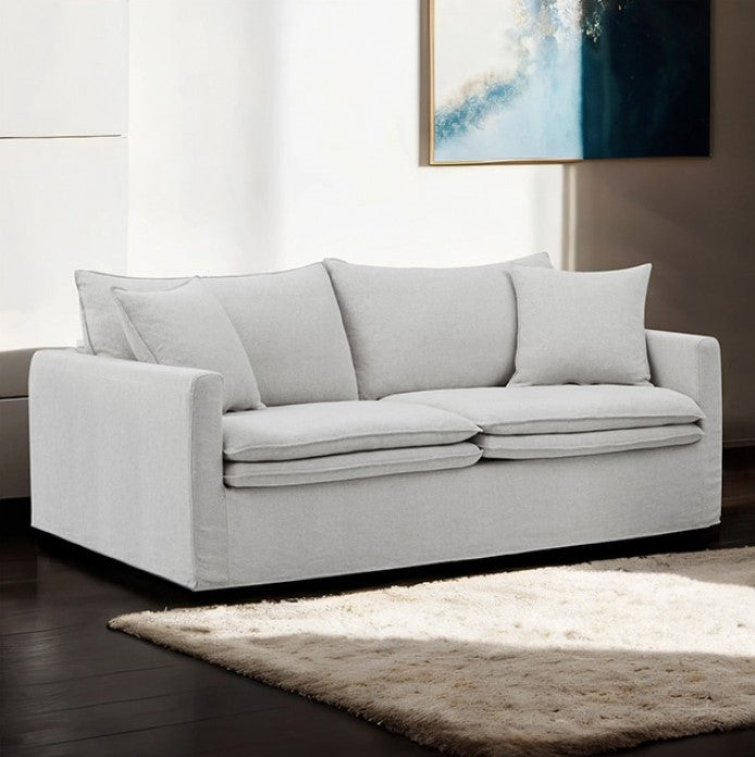 Bryant Sofa Linen Light Gray Fabric Gray sofa in a living room with a rug and wall art