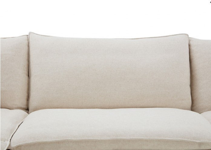 Bryant Sofa Linen Taupe Fabric White sofa in a living room with a painting on the wall