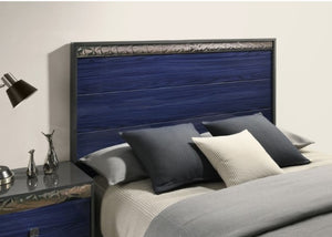 Burbandy Modern Glam Bed Bed with blue headboard and pillows in a bedroom setting