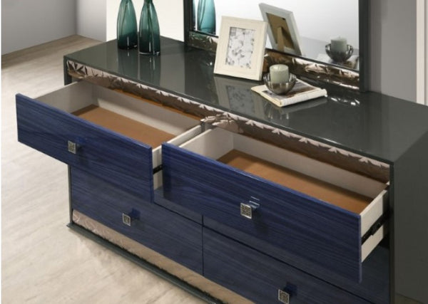 Burbandy Modern Glam Dresser Blue dresser with open drawers in a room setting