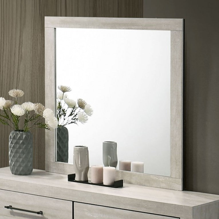 Carllos Contemporary Light Gray Mirror Rectangular mirror on a wooden dresser with decorative items.