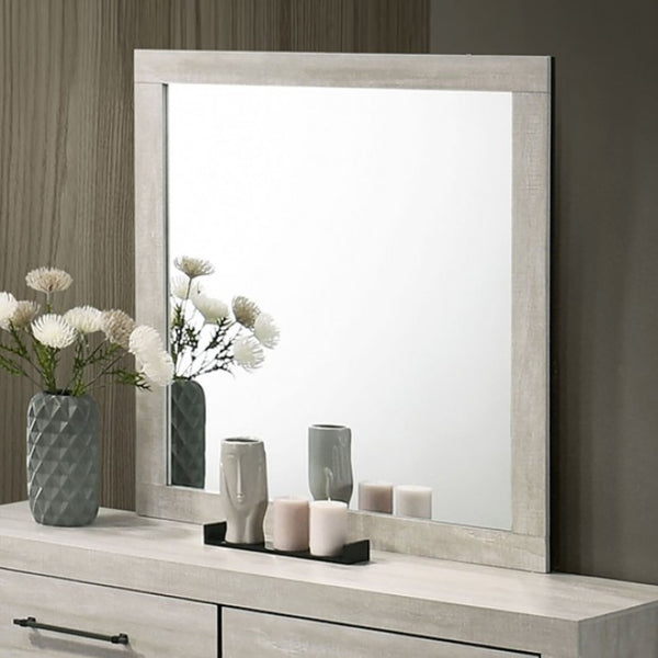 Carllos Contemporary Light Gray Mirror Rectangular mirror on a wooden dresser with decorative items.