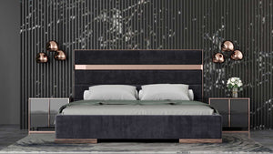 Cartier Brushed Bronze Black Velvet Modern Style Bedroom Modern bedroom setup with a dark upholstered bed, nightstands, and decorative elements.