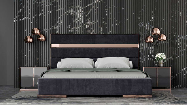 Cartier Brushed Bronze Black Velvet Modern Style Bedroom Modern bedroom setup with a dark upholstered bed, nightstands, and decorative elements.