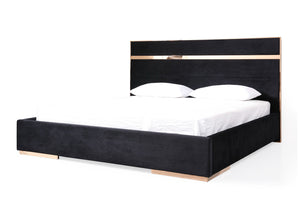 Cartier Brushed Bronze Black Velvet Modern Style Bedroom Black bed frame with white mattress and pillows on a white background
