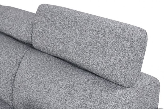 Chiller Contemporary Style Pull Out Sleeper Sectional Sofa Gray sectional sofa with a patterned pillow in a room with large windows showing greenery outside.