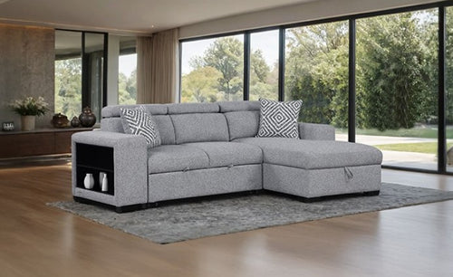 Chiller Contemporary Style Pull Out Sleeper Sectional Sofa Gray sectional sofa in a living room with large windows and greenery outside