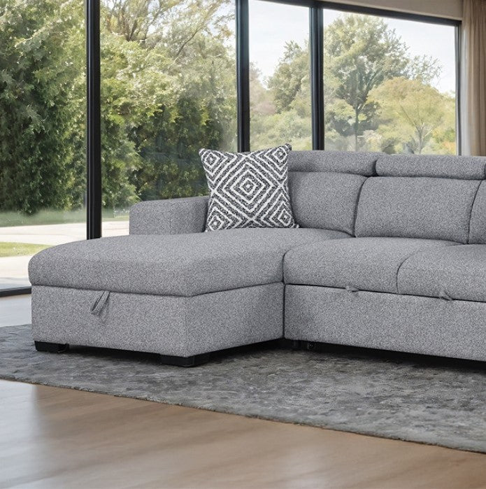 Chiller Contemporary Style Pull Out Sleeper Sectional Sofa Gray sectional sofa with a patterned pillow in a room with large windows showing greenery outside.