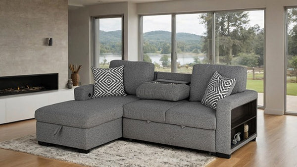 Chiller Gray Contemporary Style Pull Out Sleeper Sectional Sofa Gray sectional sofa with patterned cushions in a living room with large windows.