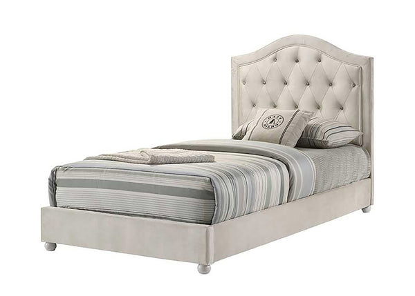 Chloe Beige Fabric Full Upholstered Kids Bed An upholstered bed frame in a light beige fabric, featuring a tall, tufted headboard and matching footboard. The bed is styled with gray and white striped bedding, pillows, and a folded blanket, set against a plain white background.