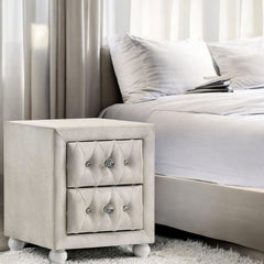 Chloe Beige Fabric Full Upholstered Kids Nightstand Beige nightstand with tufted design next to a bed in a bedroom setting