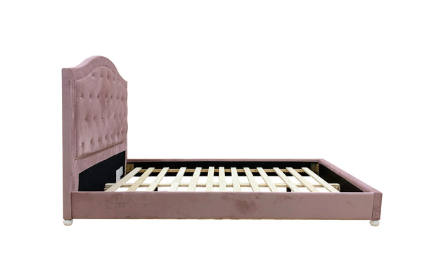 Chloe Pink Fabric Full Upholstered Kids Bed A single bed frame with a tall, tufted headboard upholstered in dusty pink velvet, shown with wooden slats on a plain white background.