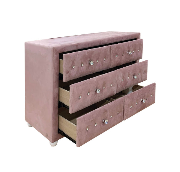 Chloe Pink Fabric Full Upholstered Kids Dresser A dusty pink velvet dresser with four drawers, some pulled out to show the light wood interiors, decorated with silver crystal-like knobs.