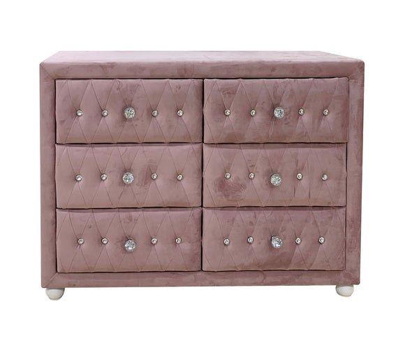 Chloe Pink Fabric Full Upholstered Kids Dresser A dusty pink velvet six-drawer dresser with diamond tufting and silver crystal-like button accents, shown against a plain white background.