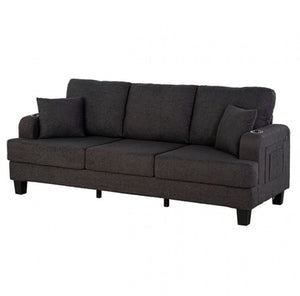 Dark gray sofa with cushions on a white background