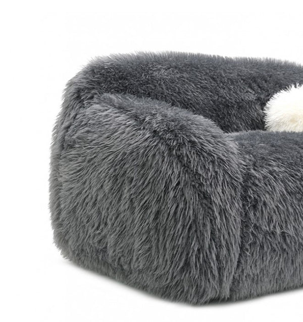 Dareen Contemporary Gray Faux Fur Sofa with Ball Pillows Gray fluffy pet bed on a white background