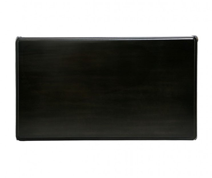 Darian Black Coffee Table Carved Details Cabriole Legs Black coffee table with decorative items on a patterned rug in a room with other tables.