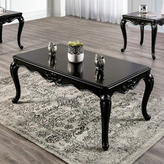 Darian Black Coffee Table Carved Details Cabriole Legs Black coffee table with decorative items on a patterned rug in a room with other tables.