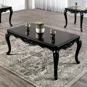 Darian Black Coffee Table Carved Details Cabriole Legs Black coffee table with decorative items on a patterned rug in a room with other tables.