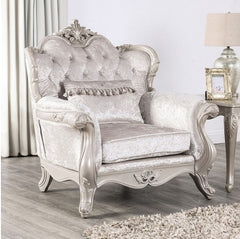 Darian Diamond Tufted Traditional Style Chair Off White Decorative armchair with intricate carvings in a room setting