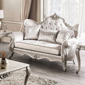 Darian Diamond Tufted Traditional Style Loveseat Off White Luxurious silver sofa in a stylish living room setting with decorative pillows.