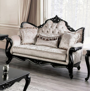 Darian Diamond Tufted Traditional Style Loveseat Decorative sofa with intricate carvings in a room with light-colored walls and curtains.
