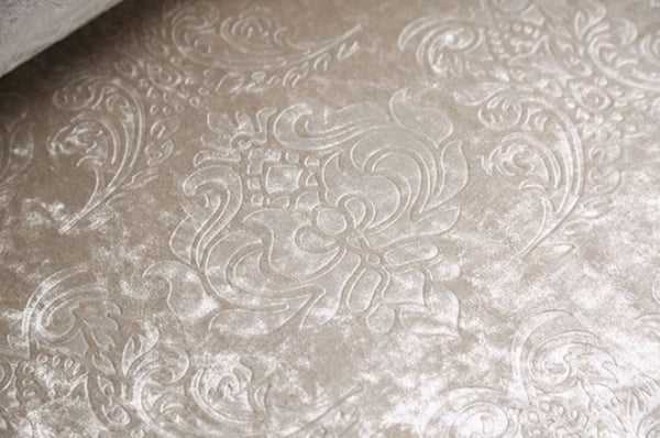 Close-up of embossed decorative Fabric with intricate patterns.