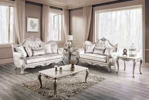 Darian Diamond Tufted Traditional Style Sofa Off White Elegant living room with ornate furniture and large windows.