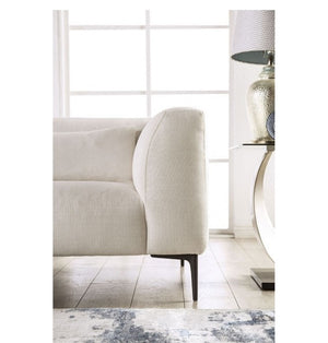 Debron Linen White Sectional Sofa Beige armchair in a modern living room with a lamp and decorative items.
