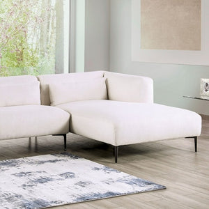 Debron Linen White Sectional Sofa White sectional sofa in a modern living room with a rug and large windows.