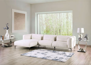 Debron Linen White Sectional Sofa Modern living room with a white sectional sofa, coffee table, and decorative items.