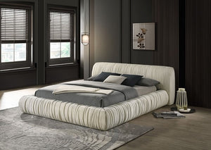 Decodale Ivory Fabric Pleated Fully Upholstered Platform Bed Modern bedroom with a large bed, windows, and decor.