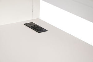 Dino Loft Bed With Full Bed Black power outlet on a white surface