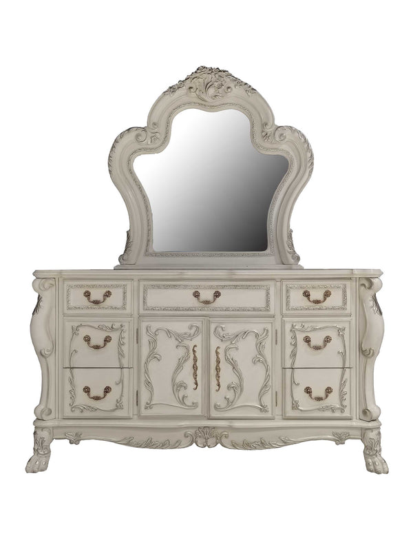 Dresden Bone White Traditional Style Dresser An ornate white carved dresser with a matching arched mirror, featuring multiple drawers and cabinet doors with decorative handles.