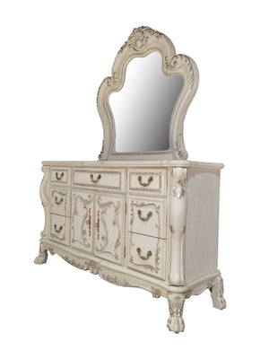 Dresden Bone White Traditional Style Dresser An ornate distressed white dresser with an arched mirror, featuring multiple drawers and carved decorative details.