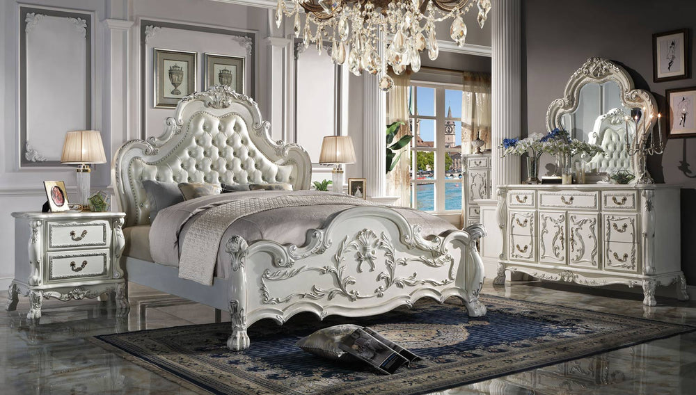 Dresden Bone White Traditional Silhouette Upholstered Bed Elegant bedroom set with a large bed, dresser, and nightstands in a stylish room.