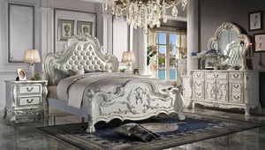 Dresden Bone White Traditional Silhouette Upholstered Bed Elegant bedroom set with a large bed, dresser, and nightstands in a stylish room.