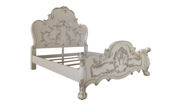 Dresden Bone White Traditional Silhouette Leaf Carving Inlay Bed An ornate, vintage-style wooden bed frame with a distressed off-white finish and detailed scrollwork, shown from a three-quarter angle against a plain white background.