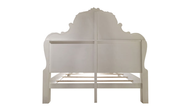 Dresden Bone White Traditional Silhouette Leaf Carving Inlay Bed A white wooden bed frame with an ornate, high arched headboard and matching footboard, shown from the front on a plain white background.