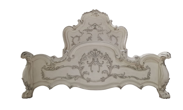 Dresden Bone White Traditional Silhouette Leaf Carving Inlay Bed An ornate, baroque-style upholstered headboard in a distressed off-white/cream fabric with dark gray carved detailing, shown against a plain white background.