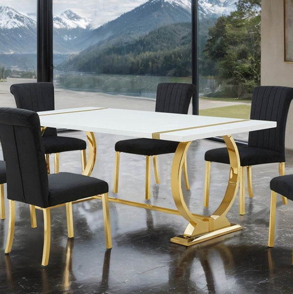 Editta Modern Glam Gold White Dining Table Dining table with gold legs and black chairs in a room with mountain view