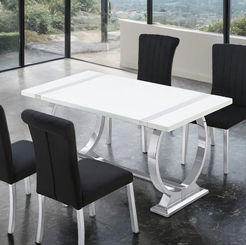 Editta Modern Glam Silver White Dining Table Dining table with black chairs in a modern room with large windows.