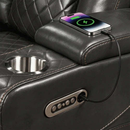 Eloise Power Gray Recliner Sectional Sofa LED Multi Color Lights Phone charging on a car cup holder with a USB cable, inside a black leather car interior.