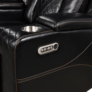 Eloise Power Recliner Sectional Sofa LED Multi Color Lights Close-up of a black leather recliner chair with diamond-quilted stitching, a side cup holder, and a silver control panel on the armrest.