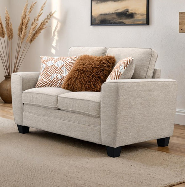 Erna Taupe Chenille Fabric Loveseat Gray sofa with decorative pillows in a living room setting