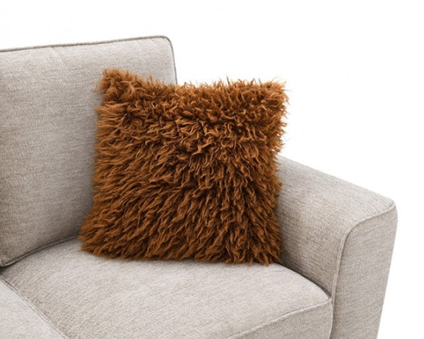 Erna Taupe Chenille Fabric Sofa Brown fluffy pillow on a gray sofa against a white background