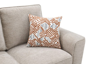 Erna Taupe Chenille Fabric Sofa Decorative pillow with geometric pattern on a beige armchair